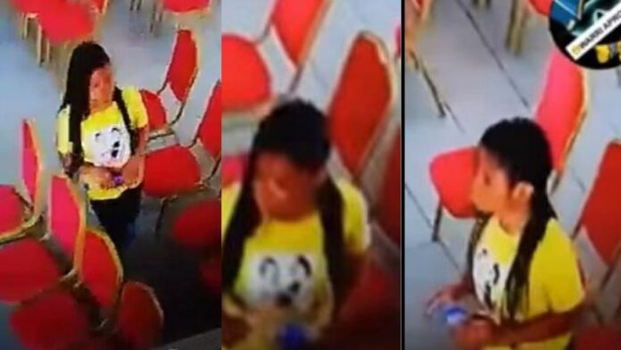 Young Lady Nabbed on CCTV stealing a phone inside a church in Warri (Video)