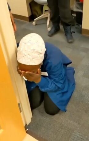 Nigerian woman sheds tears of joy as her husband, who is serving in the US Army, surprises her at work after 11 months of being deployed overseas (video)