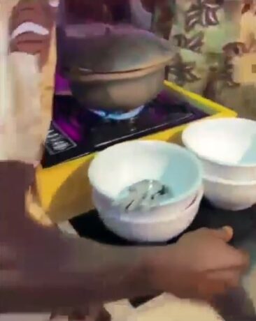 Funny reactions as Party guests served food directly from a gas stove at an event to keep it hot (video)