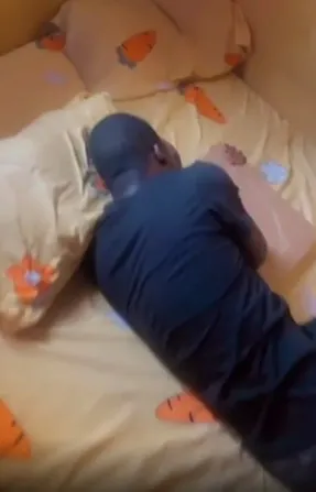 Young man soaks his pillow with tears after being dumped by girlfriend (Video)